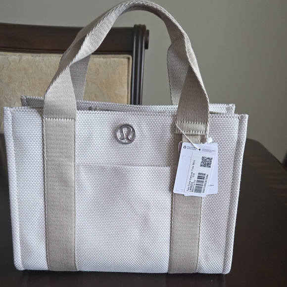 lululemon athletica Handbags - lululemon athletica Cream and Tan Mini Tote Bag